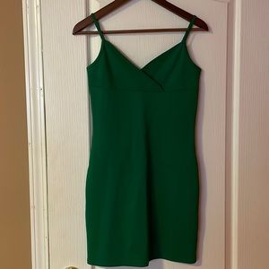 Selling super cute emerald green mini dress by Sunday Best!